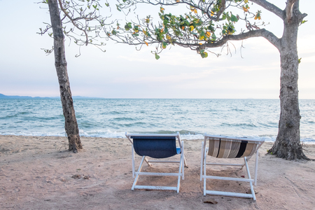 Couple beach chairs and sea viewの写真素材