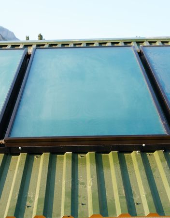 Solar panels (geliosystem) on the  roof.の写真素材