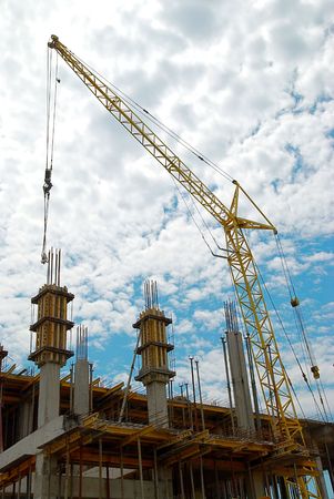 Building crane abd the building under construction.の写真素材