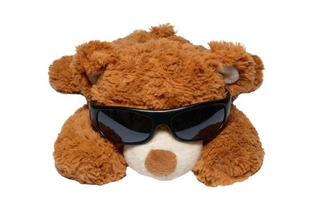Brown toy bear in sunglasses isolated on white.の写真素材