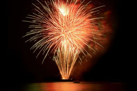 Fireworks, salute with the black sky backgroundの写真素材