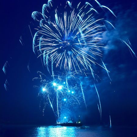 Fireworks, salute with the black sky backgroundの写真素材