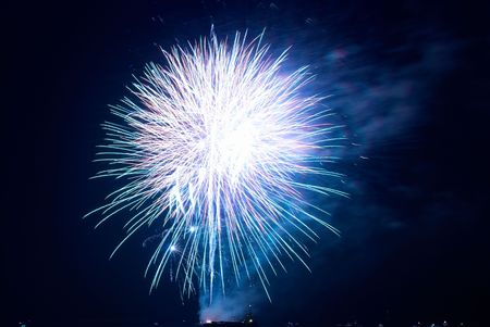 Fireworks, salute with the black sky backgroundの写真素材