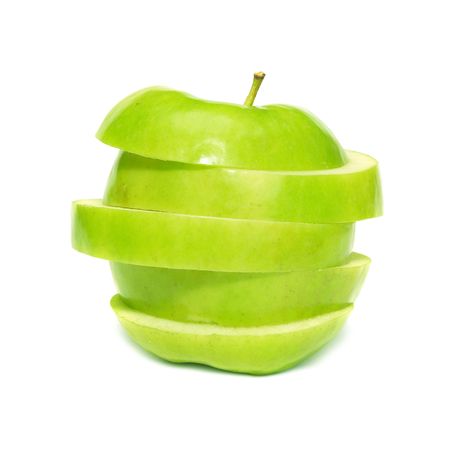 Sliced green apple isolated on white backgroundの写真素材