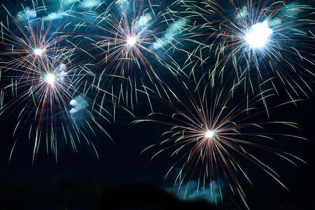 Fireworks, salute with the black sky backgroundの写真素材
