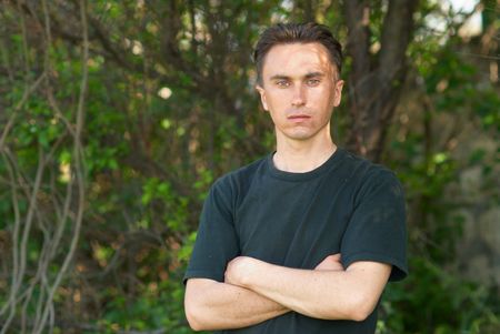 Man staying in the forest with soft background