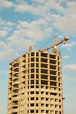 House under construction with blue sky backgroundの写真素材