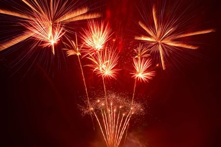 Beautiful fireworks on the black sky backgroundの写真素材