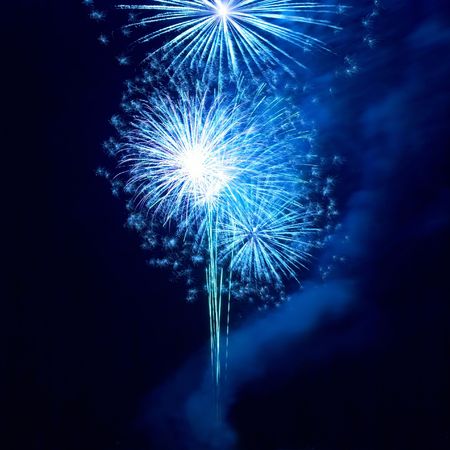 Fireworks, salute with the black sky backgroundの写真素材