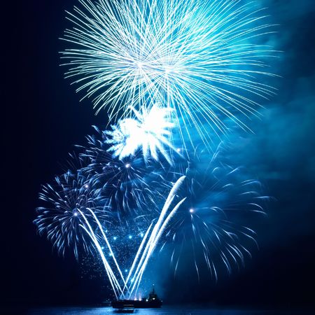 Fireworks, salute with the black sky backgroundの写真素材
