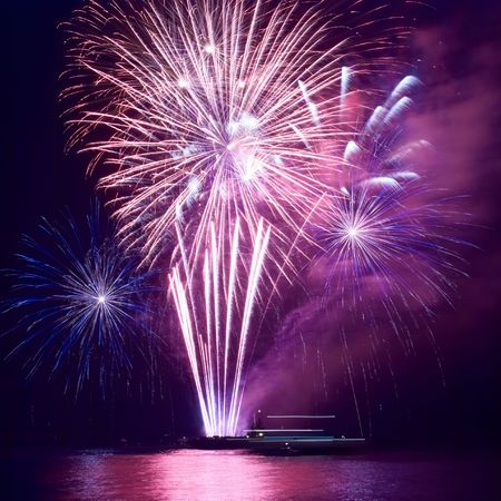 Fireworks, salute with the black sky backgroundの写真素材
