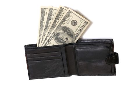 Wallet with dollars isolated on white backgroundの写真素材