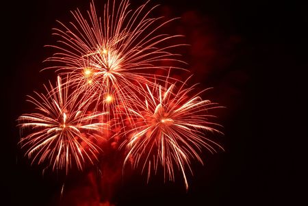 Beautiful fireworks on the black sky backgroundの写真素材