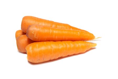 Orange carrots isolated on the white backgroundの写真素材