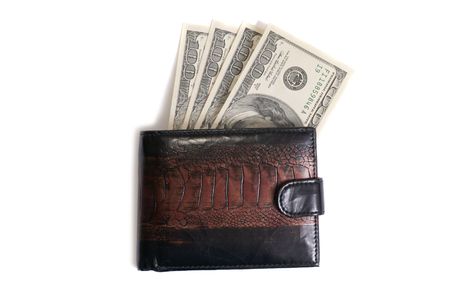 Wallet with dollars isolated on white backgroundの写真素材