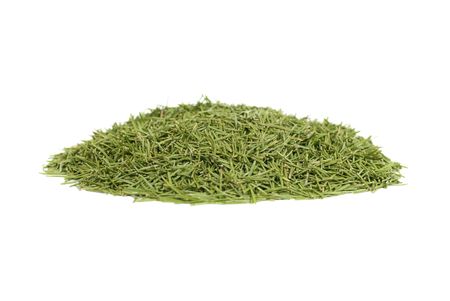 Stack of green needles isolated on whiteの写真素材