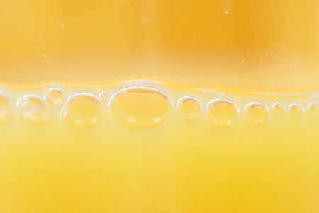 Macro orange juice can be used for backgroundの写真素材
