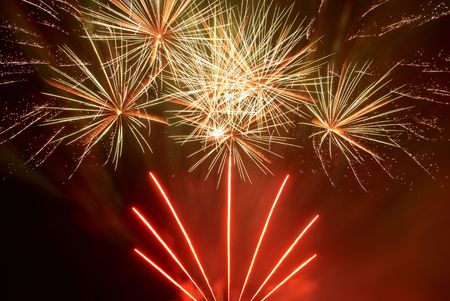 Beautiful fireworks on the black sky backgroundの写真素材