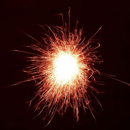Funny holiday sparkle on the black backgroundの写真素材