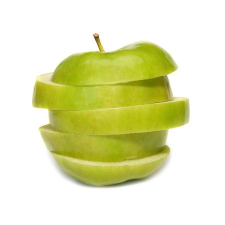 Sliced green apple isolated on white backgroundの写真素材