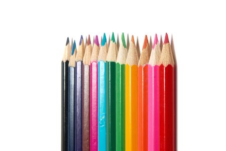 Raw of colored pencils with white isolationの写真素材