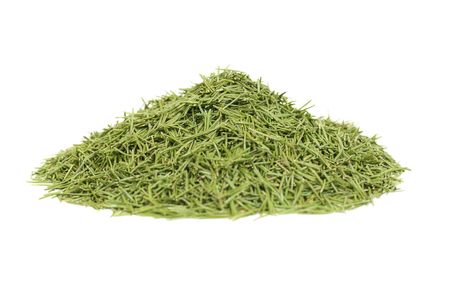 Stack of green needles isolated on whiteの写真素材