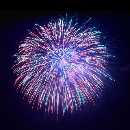 Beautiful fireworks on the black sky backgroundの写真素材