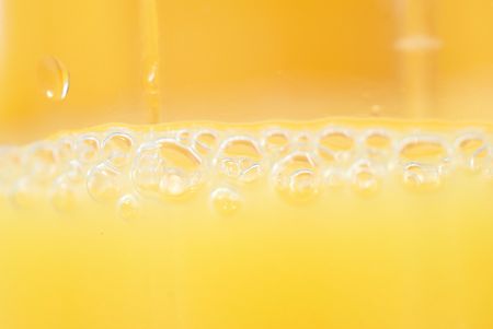 Macro orange juice can be used for backgroundの写真素材