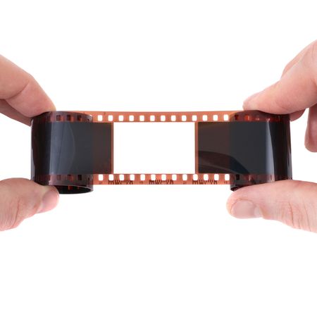 Old film with empty frame on white backgroundの写真素材