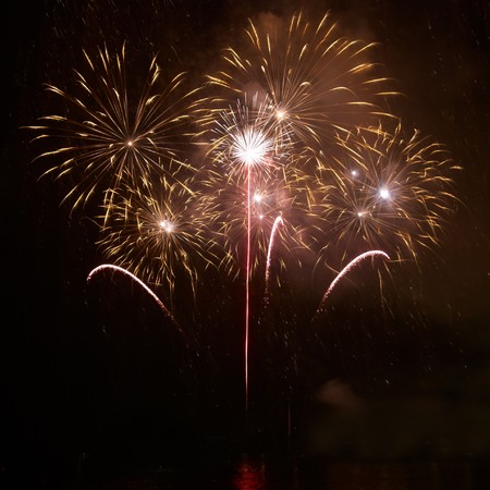 Fireworks, salute on the black sky backgroundの写真素材