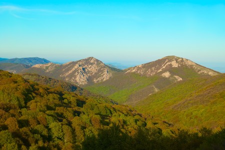 Hills with cloudscape and blue sky. Landscape.の写真素材