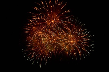 Fireworks, salute on the black sky backgroundの写真素材