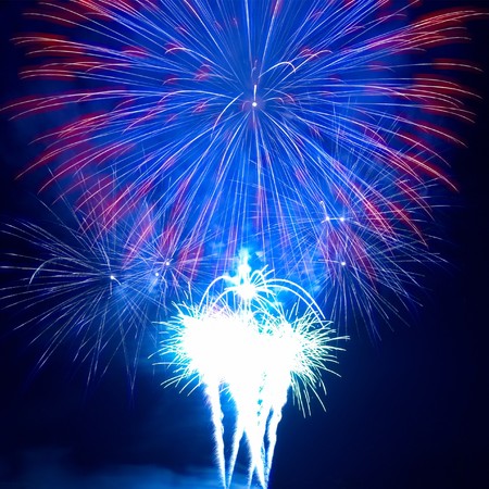 Colorful fireworks on the black sky backgroundの写真素材