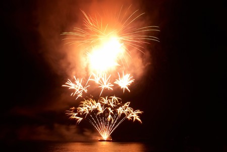 Colorful fireworks on the black sky backgroundの写真素材