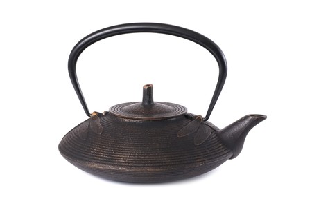 Old iron japanese teapot isolated on white backgroundの写真素材