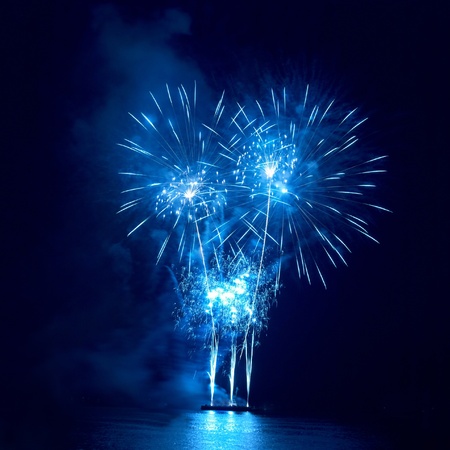 Colorful fireworks on the black sky backgroundの写真素材