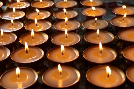 Rows of candles in the indian templeの写真素材