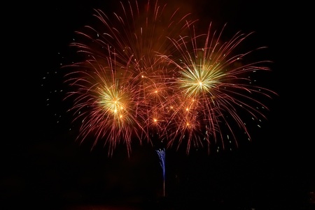 Colorful fireworks on the black sky backgroundの写真素材