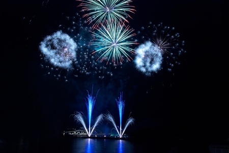 Colorful fireworks on the black sky backgroundの写真素材