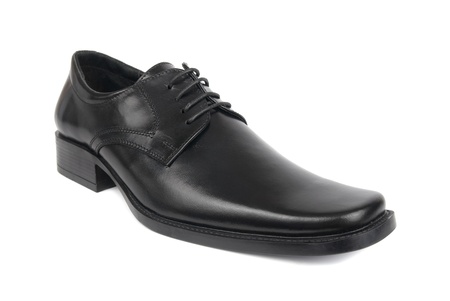 Right man's black shoe isolated on white backgroundの写真素材