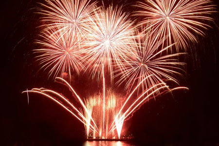 Colorful fireworks on the black sky backgroundの写真素材