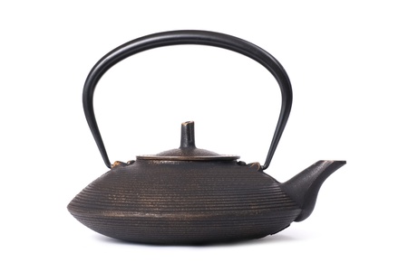 Old iron japanese teapot isolated on white backgroundの写真素材