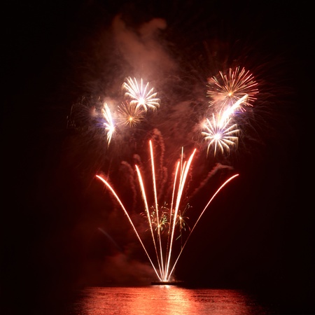 Colorful fireworks on the black sky backgroundの写真素材