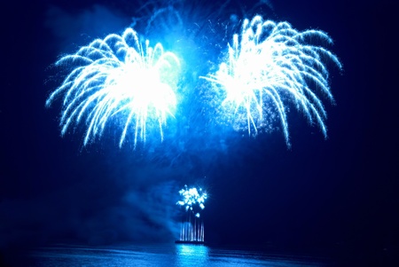 Colorful fireworks on the black sky backgroundの写真素材