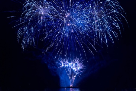Colorful fireworks on the black sky backgroundの写真素材