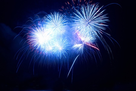 Colorful fireworks on the black sky backgroundの写真素材