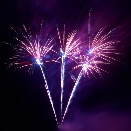 Colorful fireworks on the black sky backgroundの写真素材