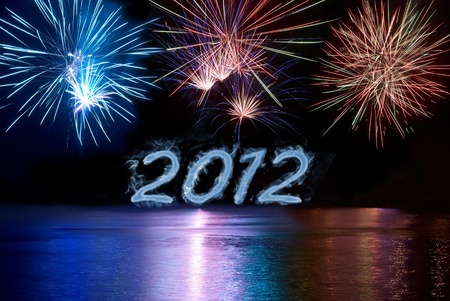 Happy new 2012 year. Postcard with colorful fireworks under waterの写真素材
