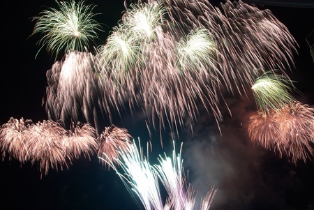 Colorful fireworks on the black sky backgroundの写真素材