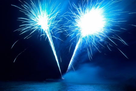 Colorful fireworks on the black sky backgroundの写真素材